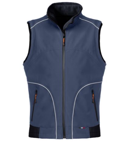 Gilet da lavoro in softshell colore blu navy, con inserti rinfrangenti. Tessuto in Poliestere.