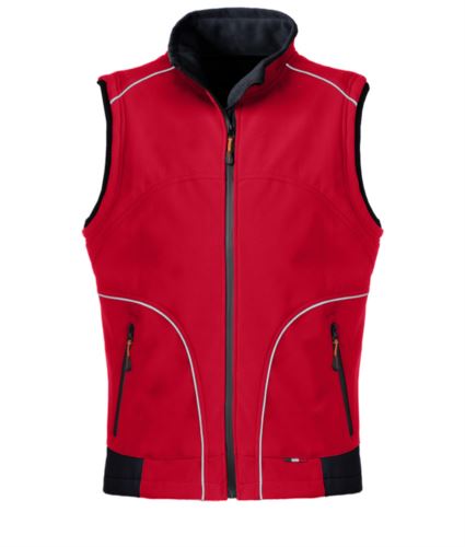 Gilet da lavoro in softshell colore rosso, con inserti rinfrangenti. Tessuto in Poliestere.