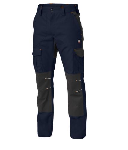 Pantalone da lavoro multitasche con vita elasticizzata, tasche davanti, tasconi laterali chiusi con pattina e bottoni a pressione, predisposizione per porta badge staccabile su tascone destro, tasca sul dietro destro chiusa con pattina e bottoni a pressione, porta martello sul dietro destro, tasca porta metro sul dietro destro, tessuto doppio su zona ginocchia, travette colorate in contrasto e dettagli reflex. Colore: Blu Navy